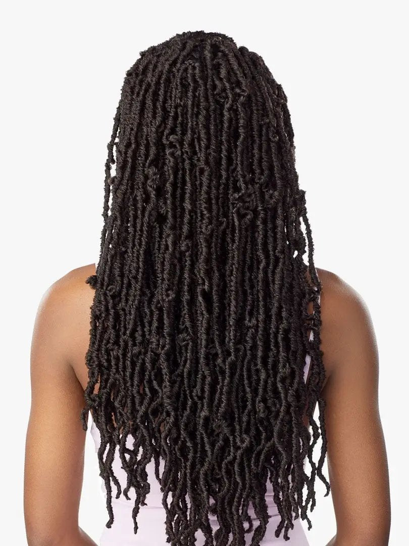 image of the back of a girl with locs